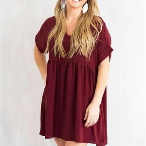Solid Rolled Sleeve Babydoll Dress with Pockets from Entro!